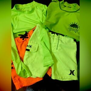 Boys swim wear. 2 pairs of Hurley shorts, long & short sleeve Size 4/5
